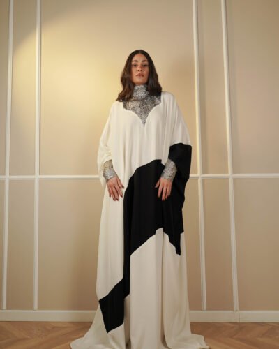 Two toned mia crepe kaftan fined by  collar and hand cuffed golden broccade